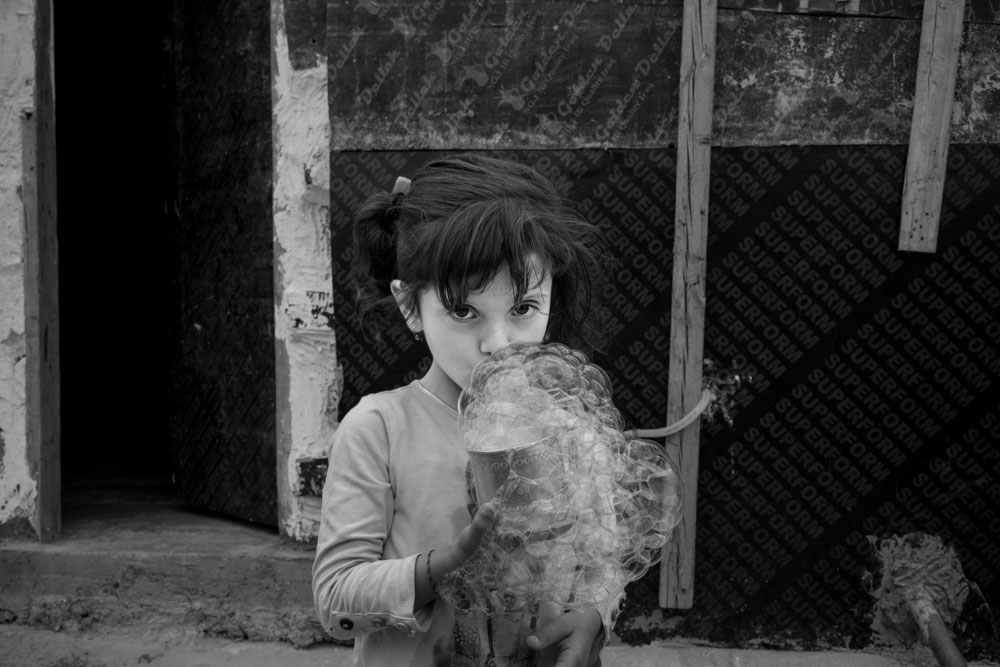  تصوير الكساندر افونسو - نازحون ايزديون لا يملكون شيئا لكنهم يهبون كل شيء 